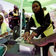 Officials from the Independent Electoral and Boundaries Commission (IEBC) records finger prints of a man as they collect data from the electorate during the launch of the 2017 general elections voter registration exercise within Kibera slums in Kenya's capital Nairobi, January 16, 2017.